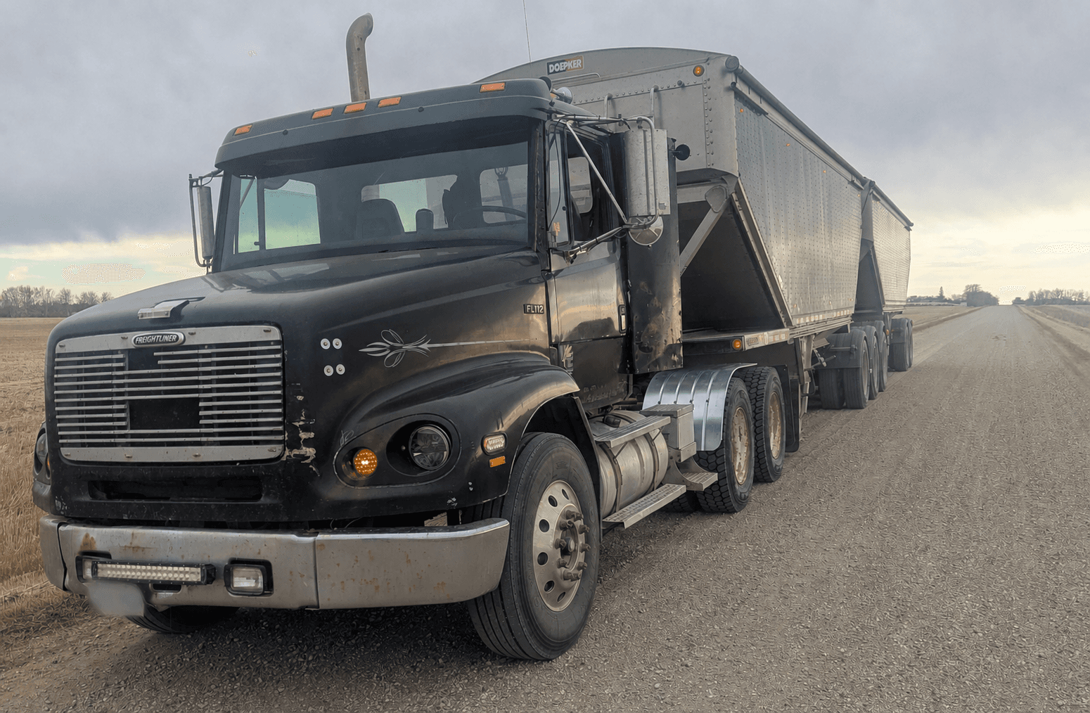 Grain truck travelling during harvest